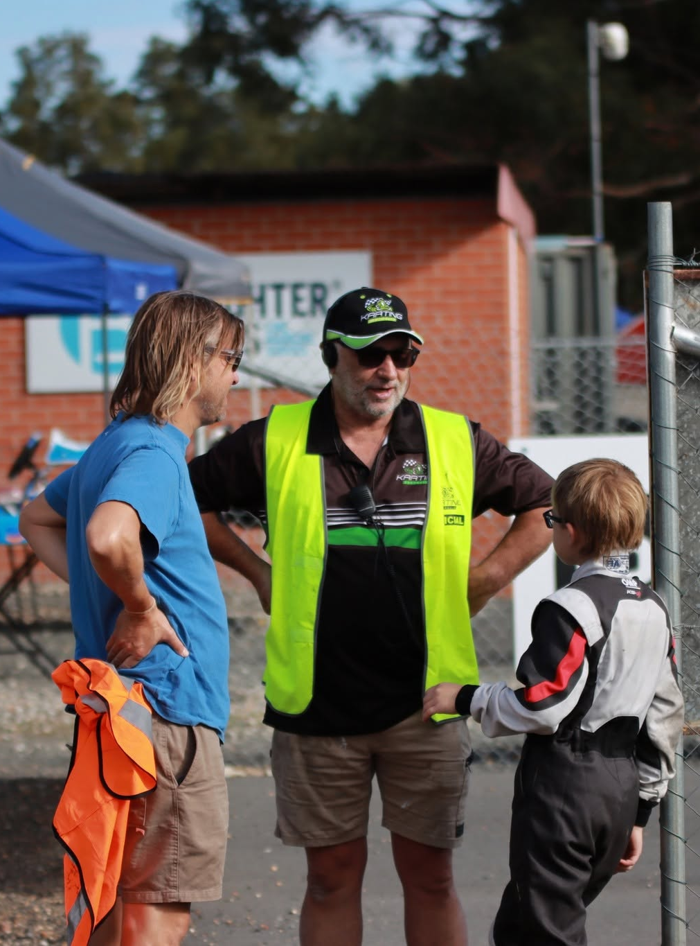 Club official welcoming a young karter and parent at Ballarat Kart Club